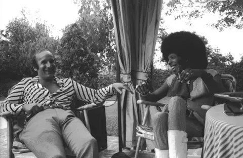 Getty Images Clive Davis and Sly Stone in the 1970s